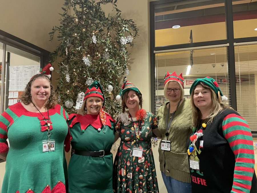 The ladies of the student office celebrating an elf-themed spirit day. Left to right: Heidi Maloney, Kristi Connelly, Andrea Gillespie, Patricia Case, Anita Maher