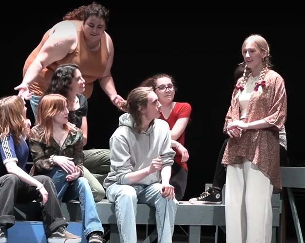 Tallan Avery as Romeo rehearses surrounded by castmates.